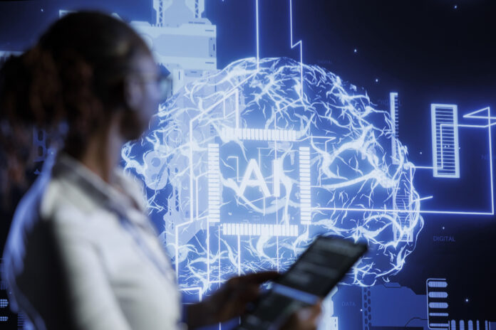 Computer scientist updating AI systems La IA podría automatizar hasta el 26 % del trabajo creativo