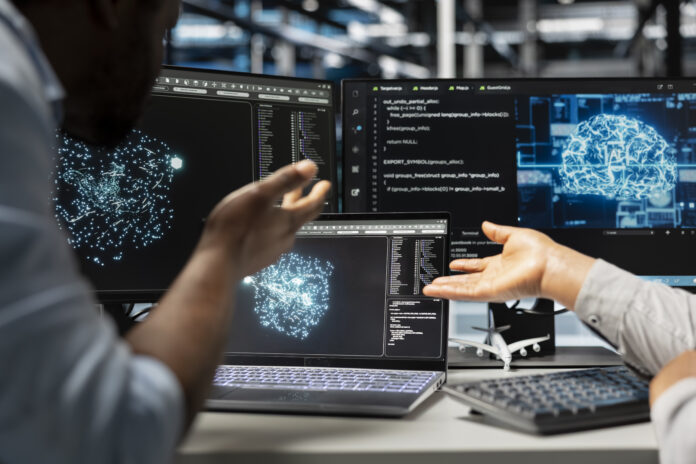 Server farm engineering team looks at data analysis graph La inteligencia artificial gana terreno como fuente de orientación frente a los influencers virtuales